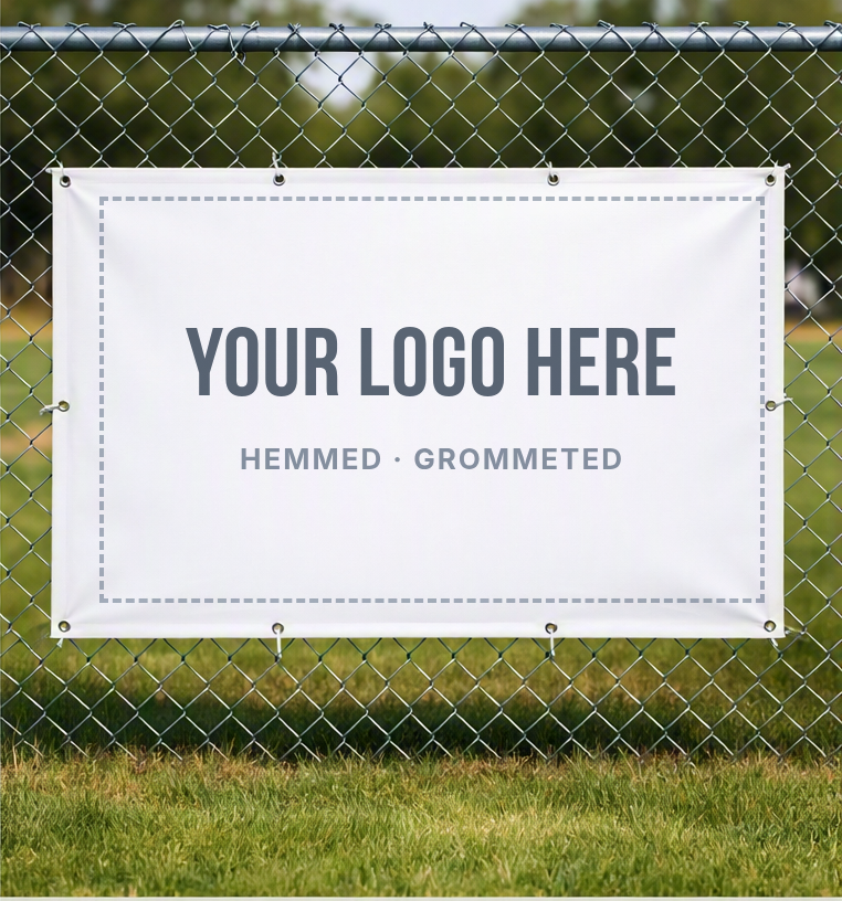 Blank white vinyl banner with grommets, fastened to a chain link fence.